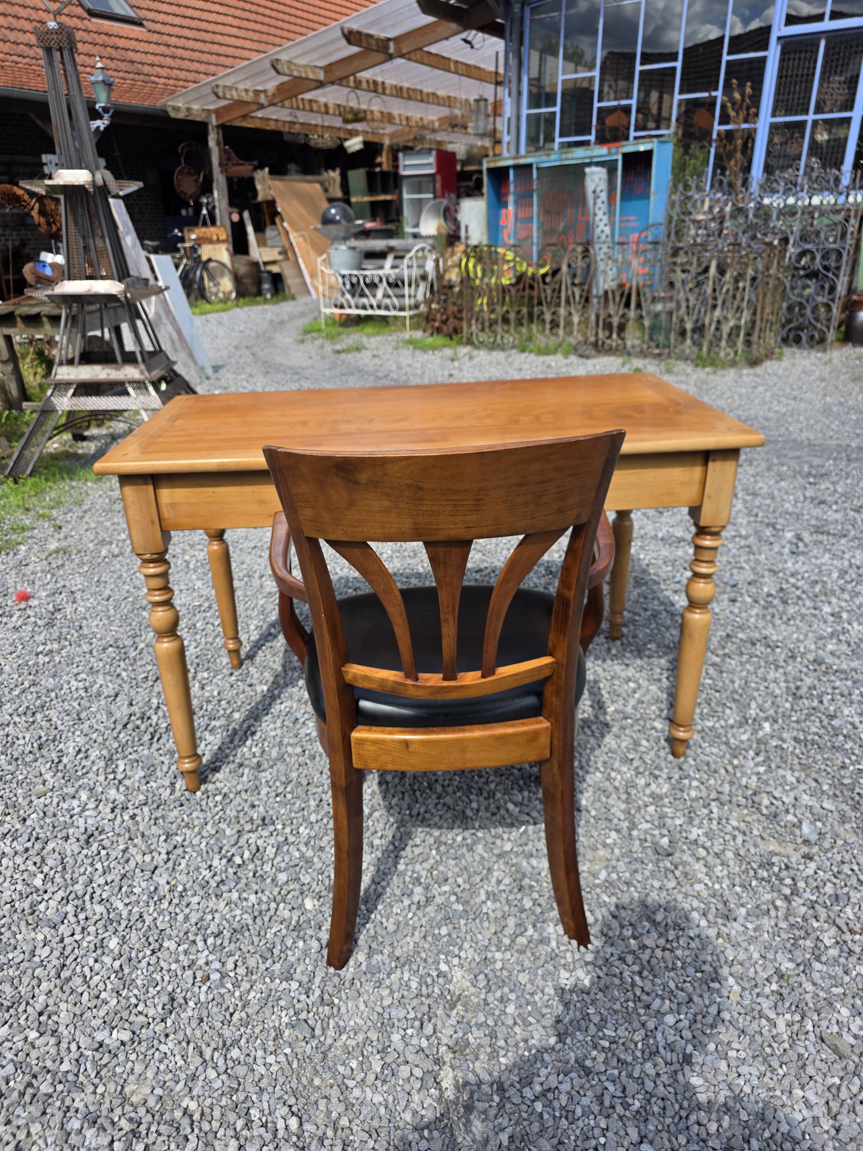 Mid-20th century solid cherry wood office chair.