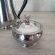 Rémy Letang / Teapot, milk jug and sugar bowl in 18/10 stainless steel and Bakelite