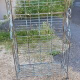 Wrought iron shelf on worked feet