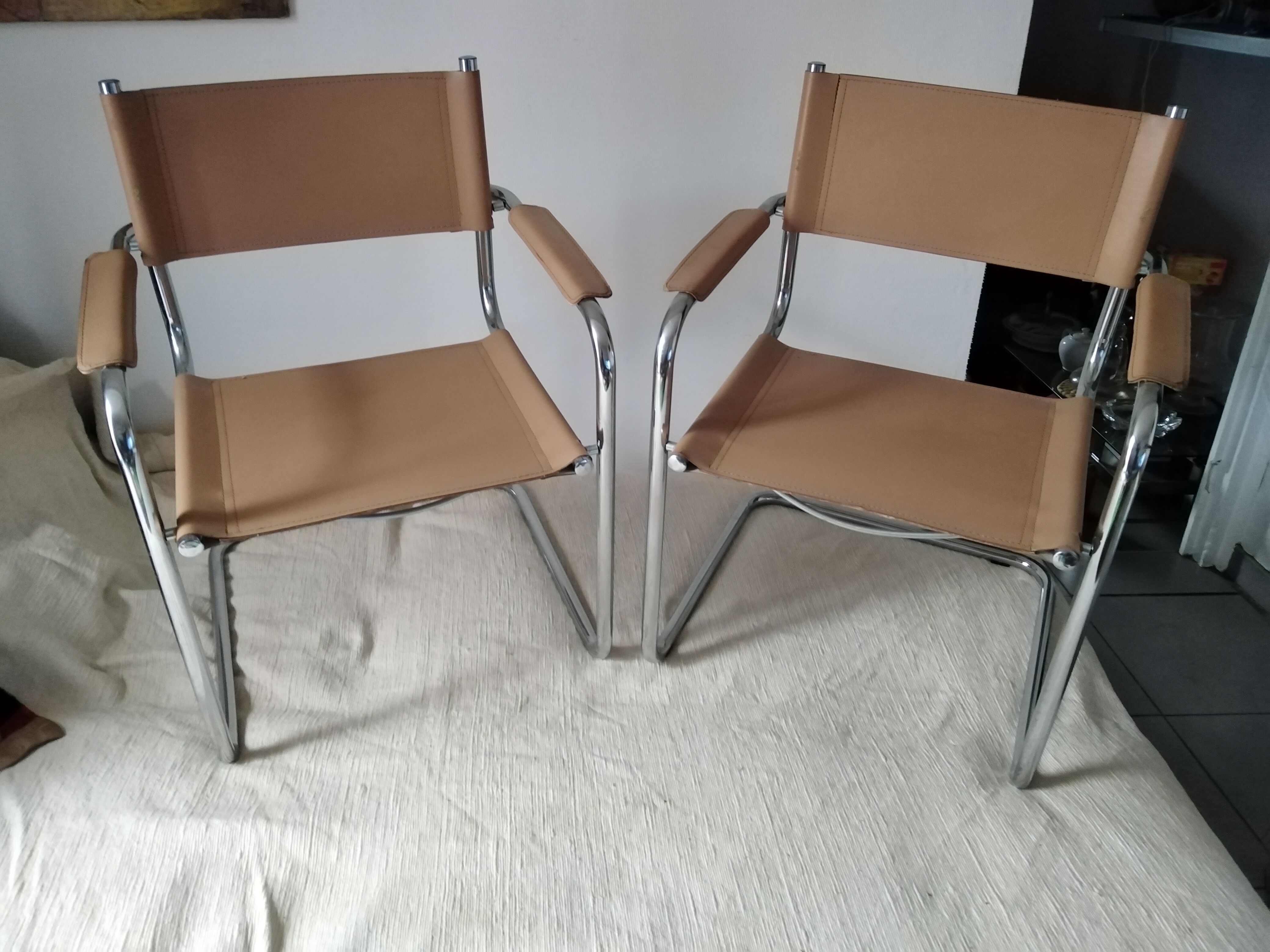 Pair of leather and chrome armchairs