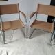 Pair of leather and chrome armchairs