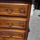 Curved commode in Louis XV style made of cherry wood.