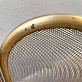 Antique brass fireplace screen from 1920, vintage spark guard.