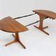 Table à manger ronde extensible vintage en teck massif des années 1960.