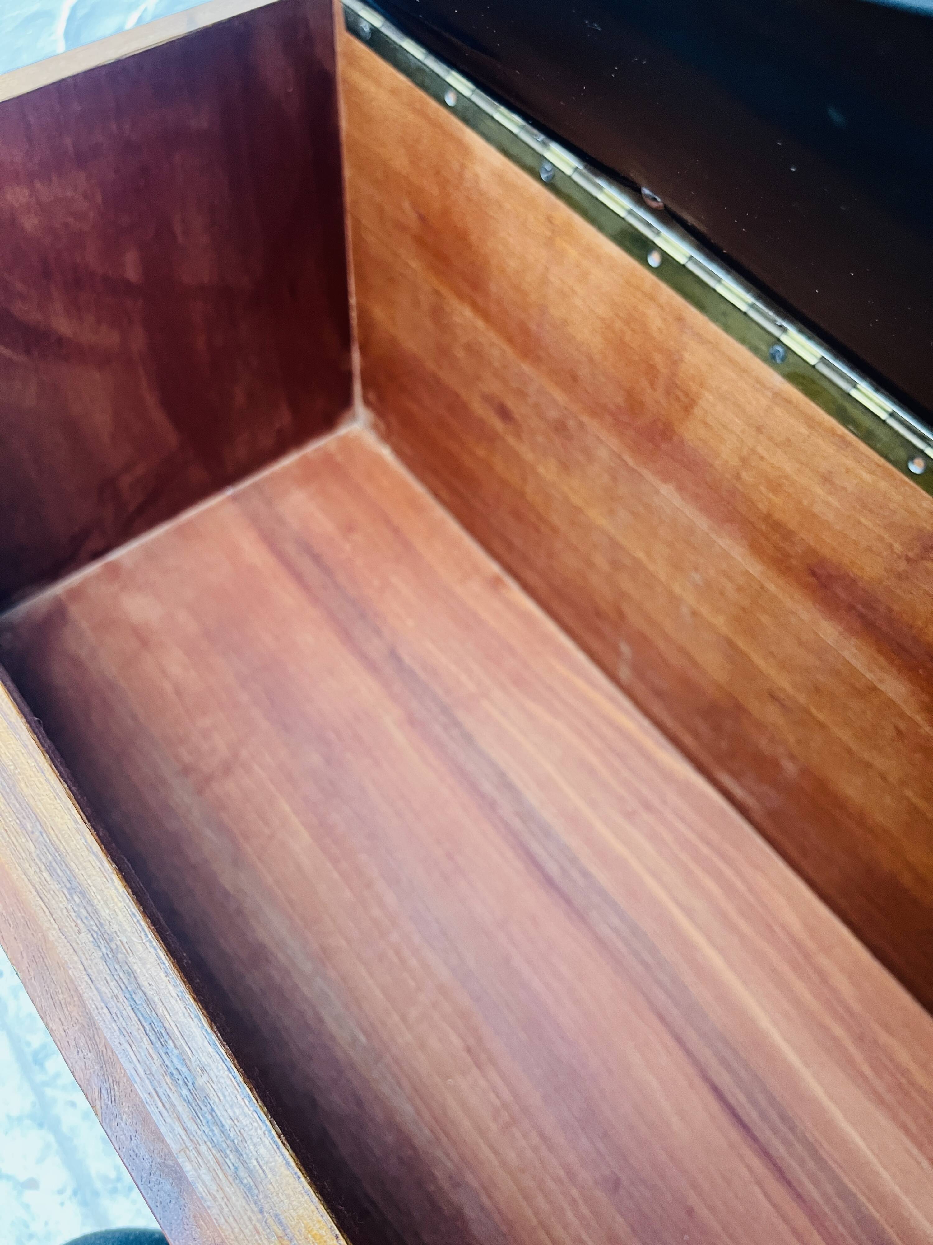 Vintage wall coat rack with storage bench from the 1970s.