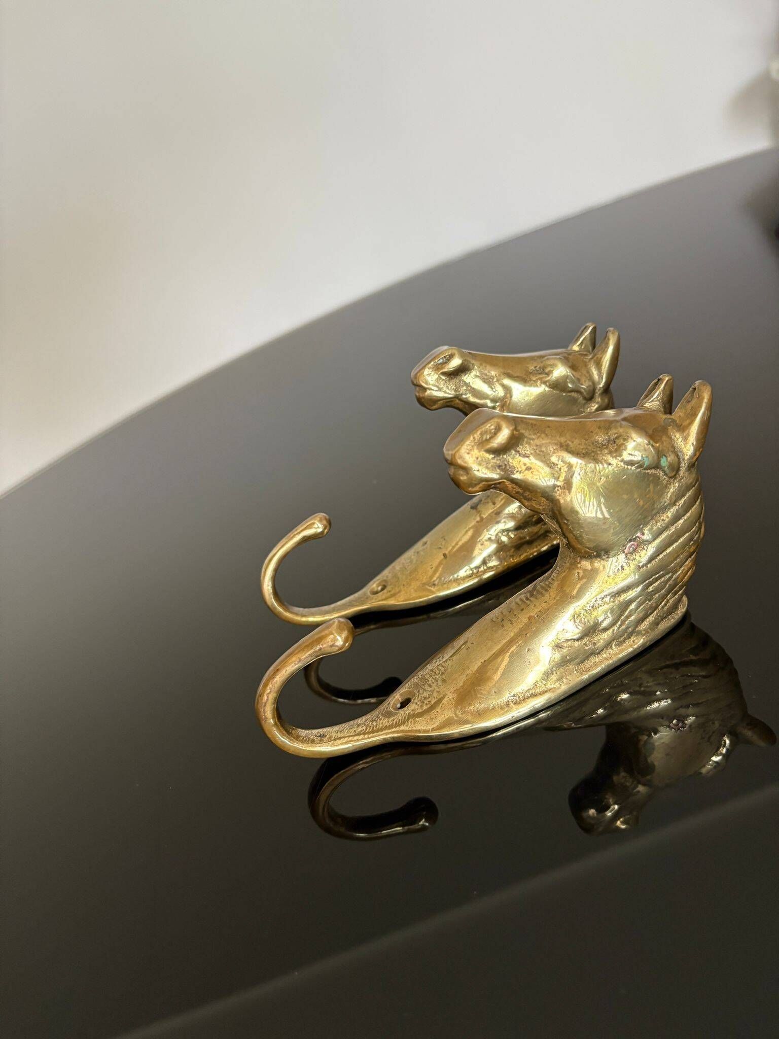 Pair of bronze coat hooks - Italy, 1950s