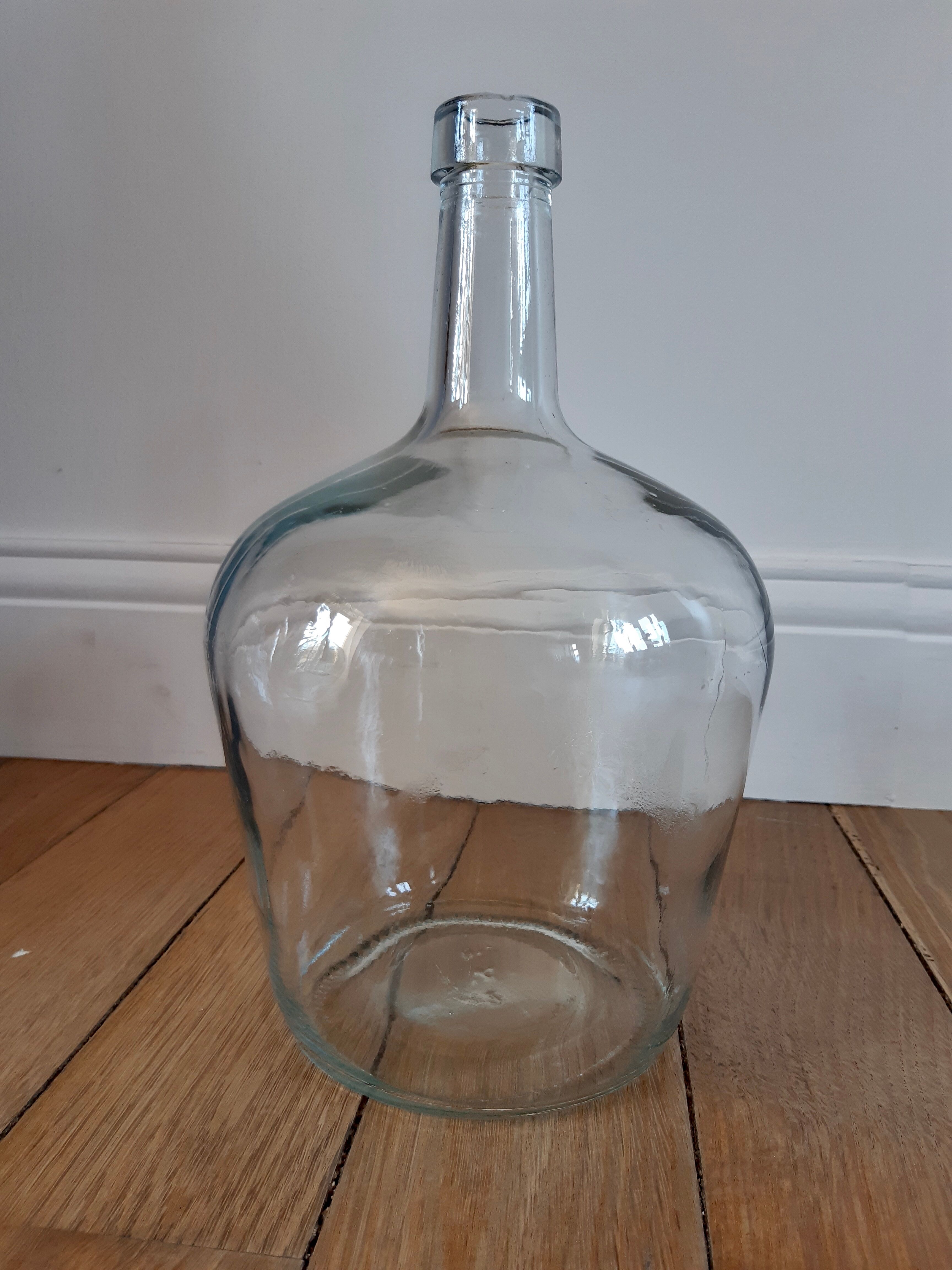 Vintage transparent demijohn