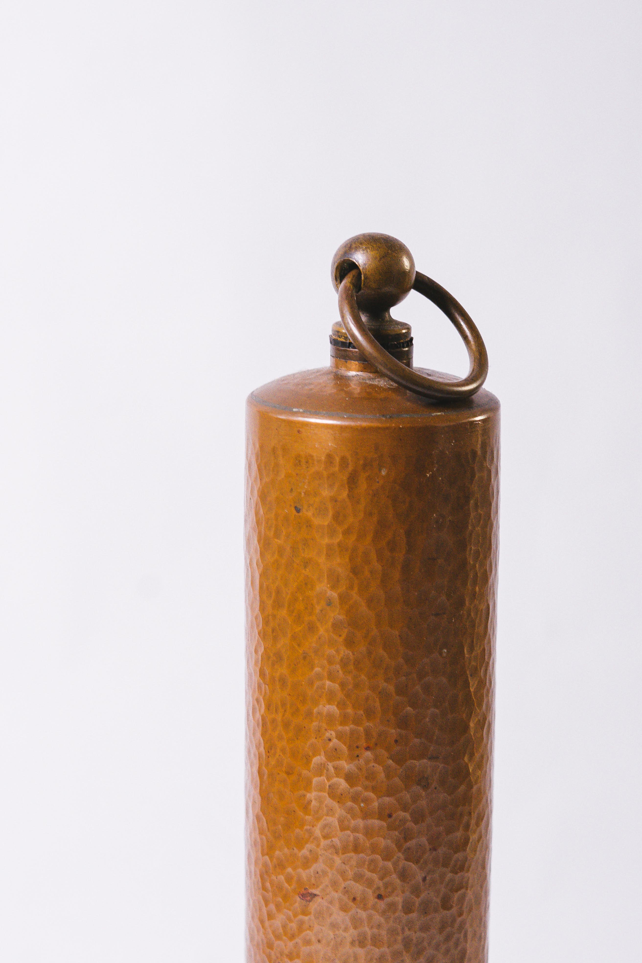 Old copper hot water bottle