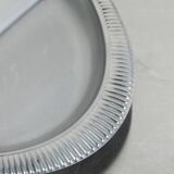 serviteur ovale en inox contour travaillé