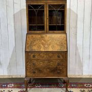 Scriban in English with a walnut finish from the 1930s.