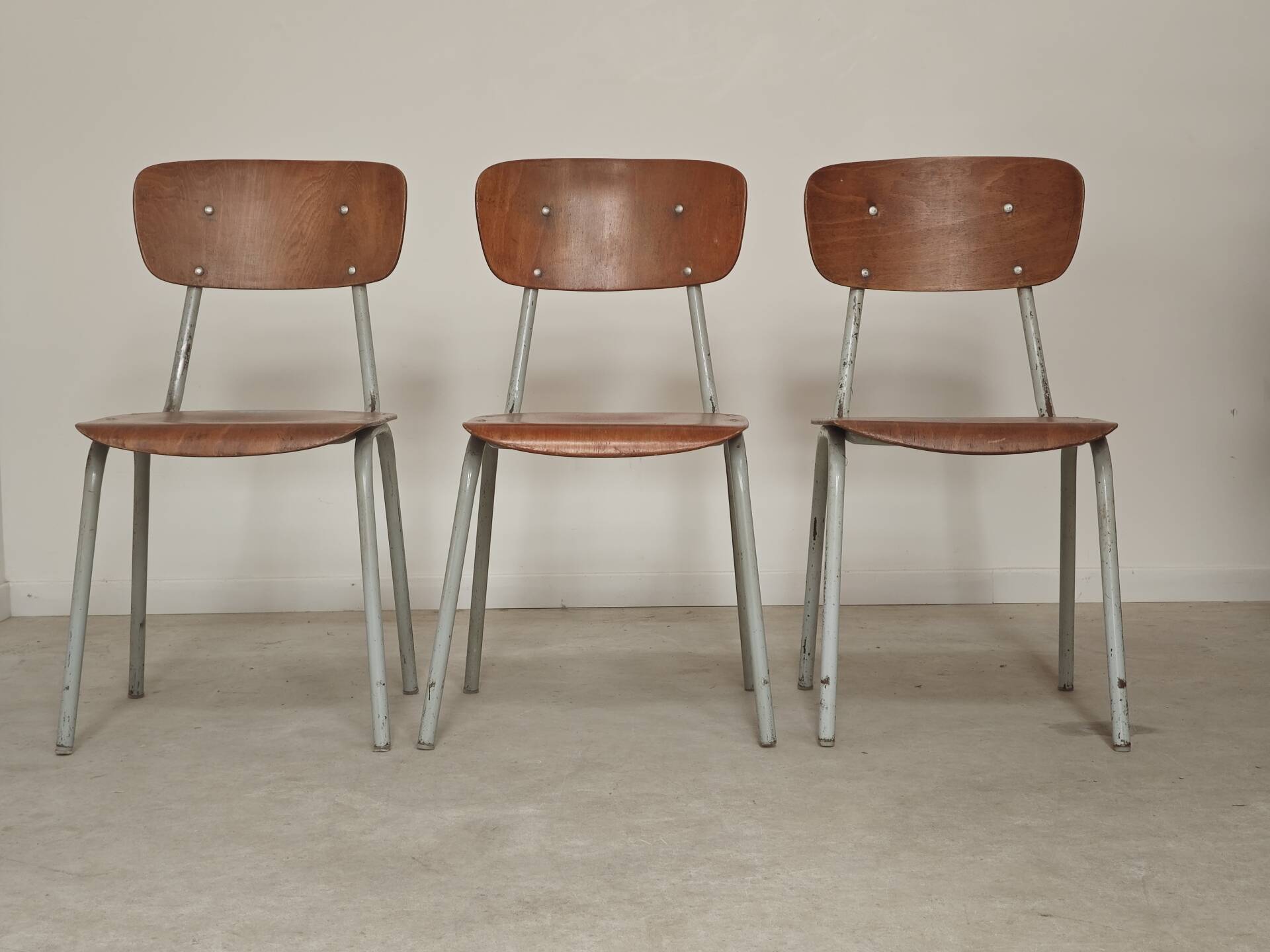 Set of 3 Czech school chairs in metal and wood.