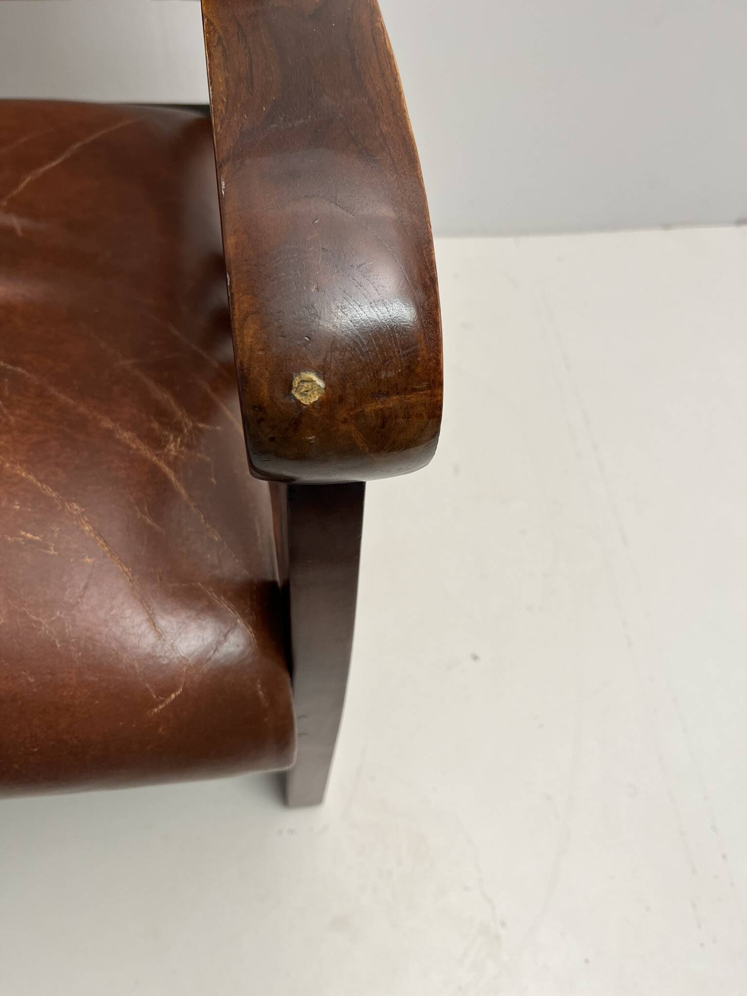 Colonial armchair in teak and leather