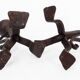 Pair of tripod candlesticks in wrought iron, neo-Gothic style, French work.