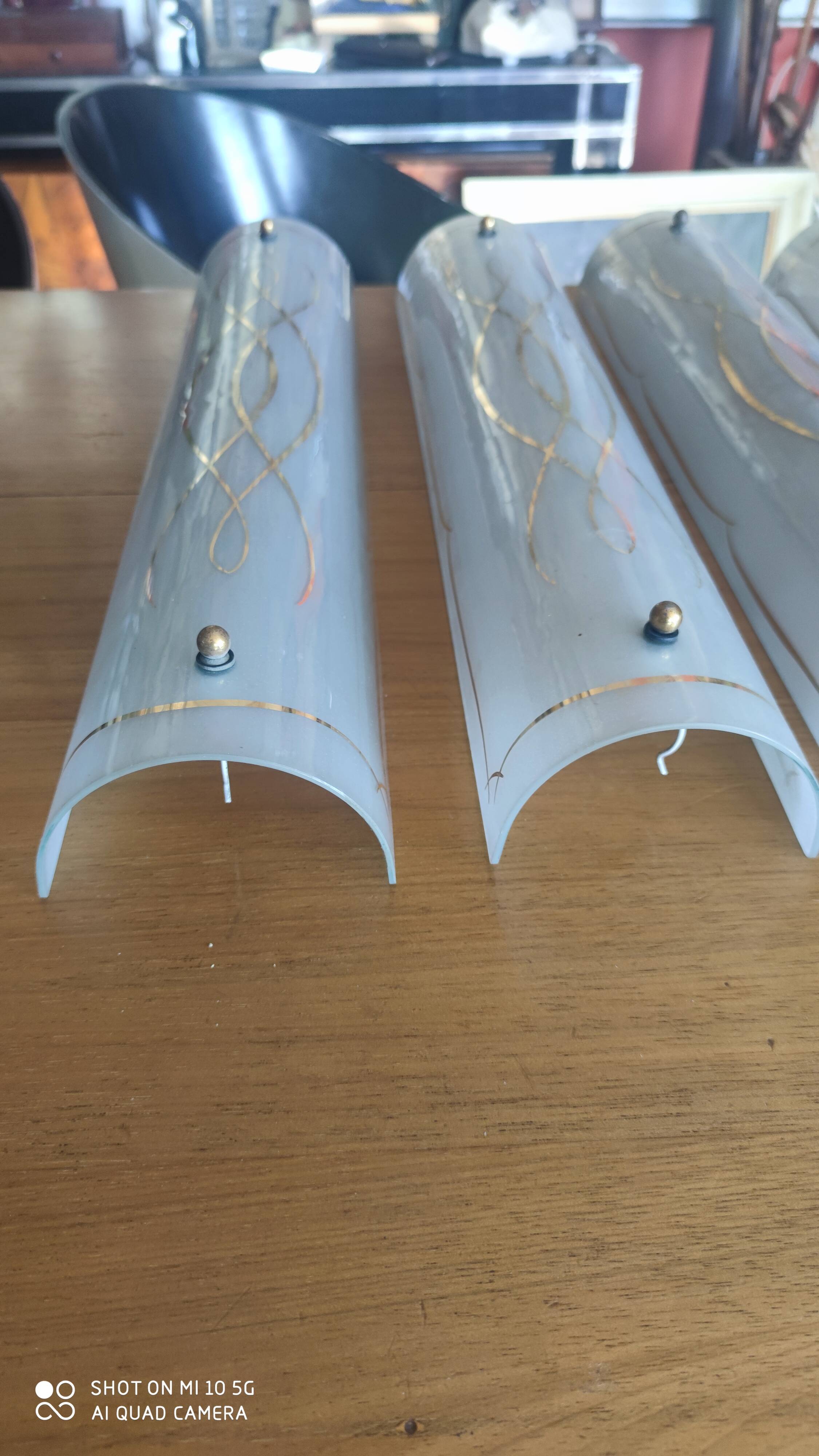 Set of 4 glass wall sconces circa 1940