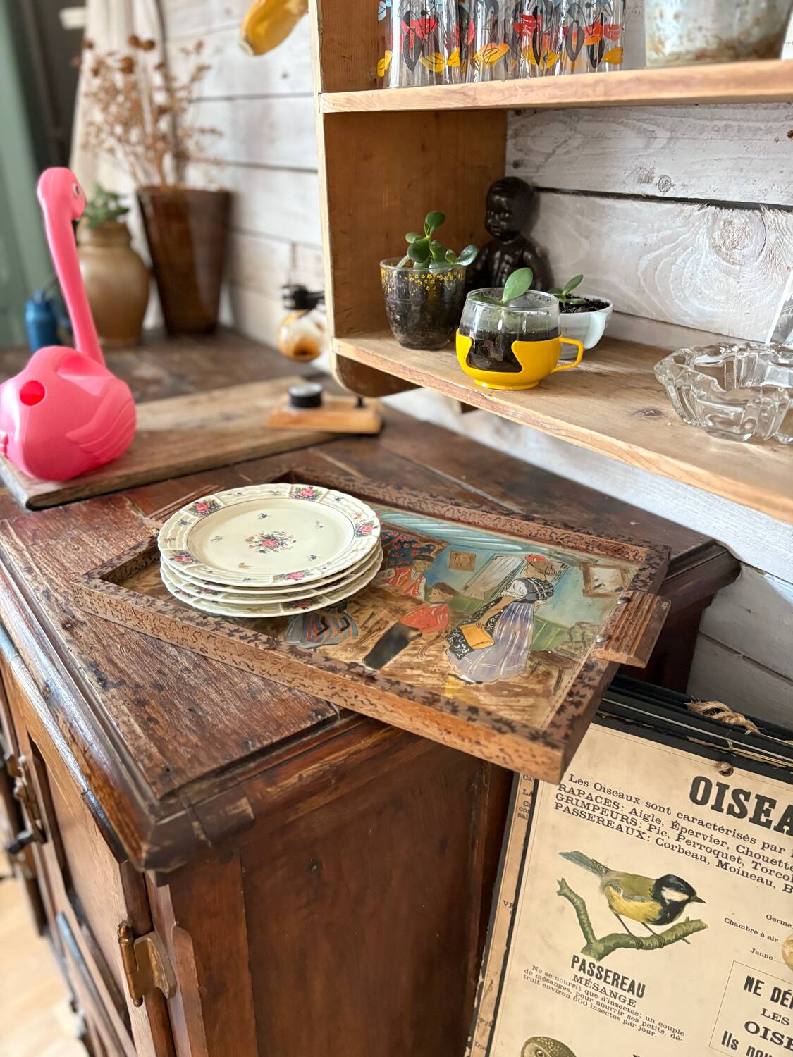 Antique wooden tray depicting a family scene