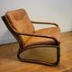 Vintage rattan armchair with leather cushions from 1970