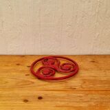 Triskelion cast iron trivet