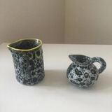 Set of two small Vallauris yellow and black milk jugs