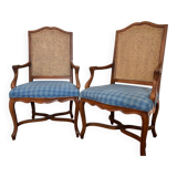 Two Regency-style caned armchairs with upholstered seats