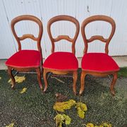 4 red velvet medallion chairs