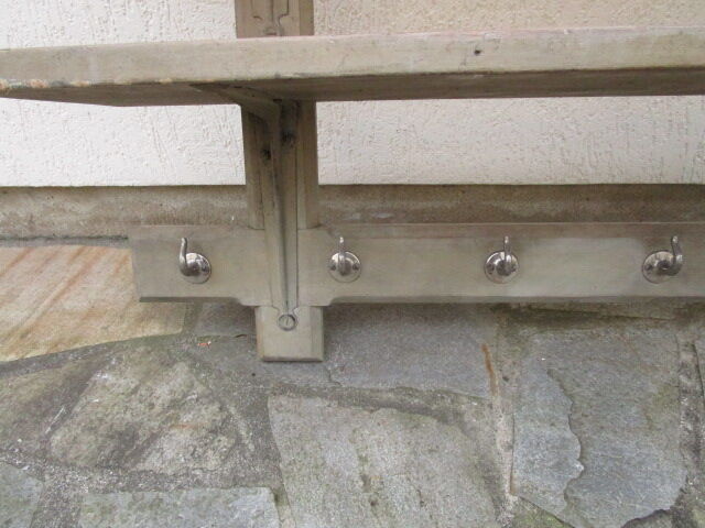 Old wall workshop shelf with coat rack