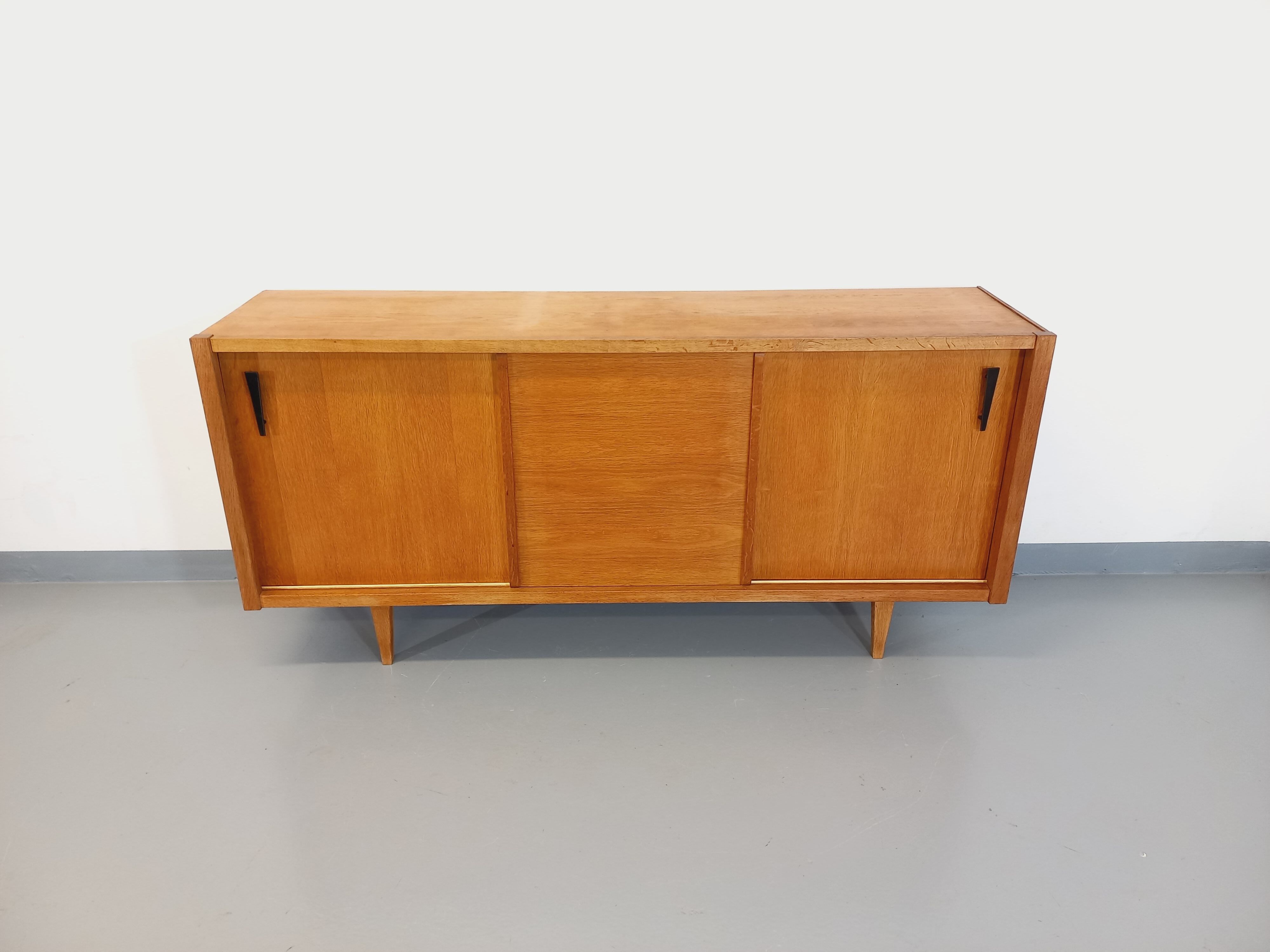 Vintage row in light oak wood from the 60s