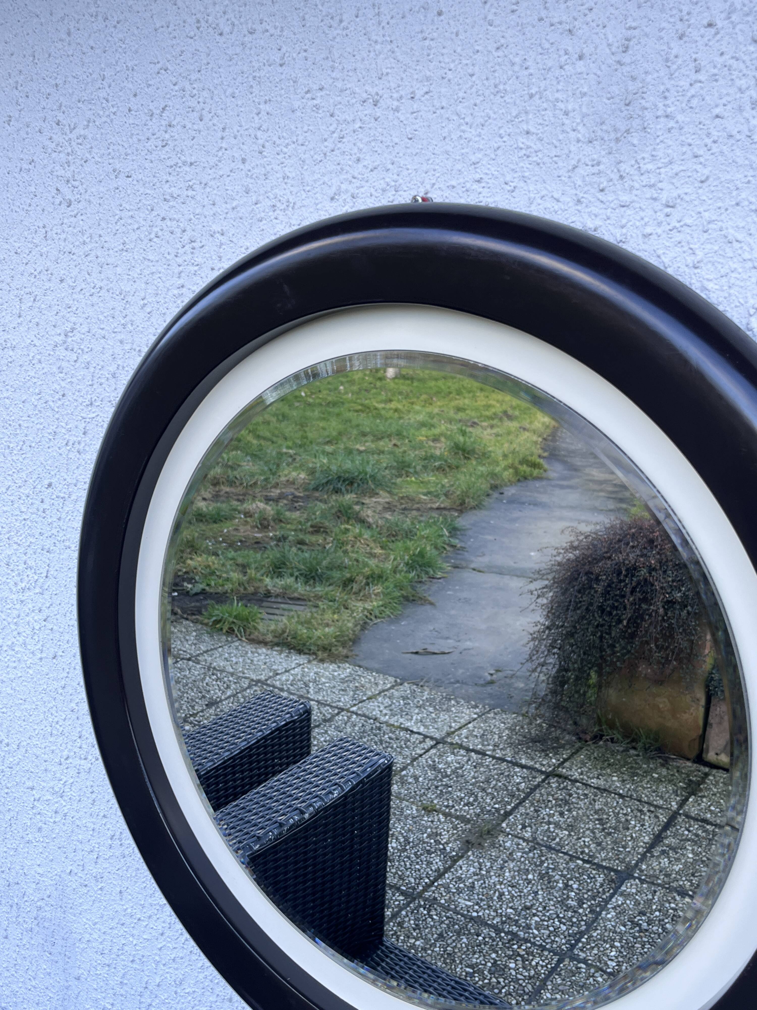 Round vintage mirror in brown resin – 1970s modernist design