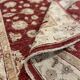 Tapis oriental en laine rouge motif floral,  fait main