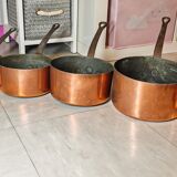 Set of 7 copper pans / brass handle