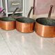 Lot de 7 casseroles en cuivre / manche en laiton