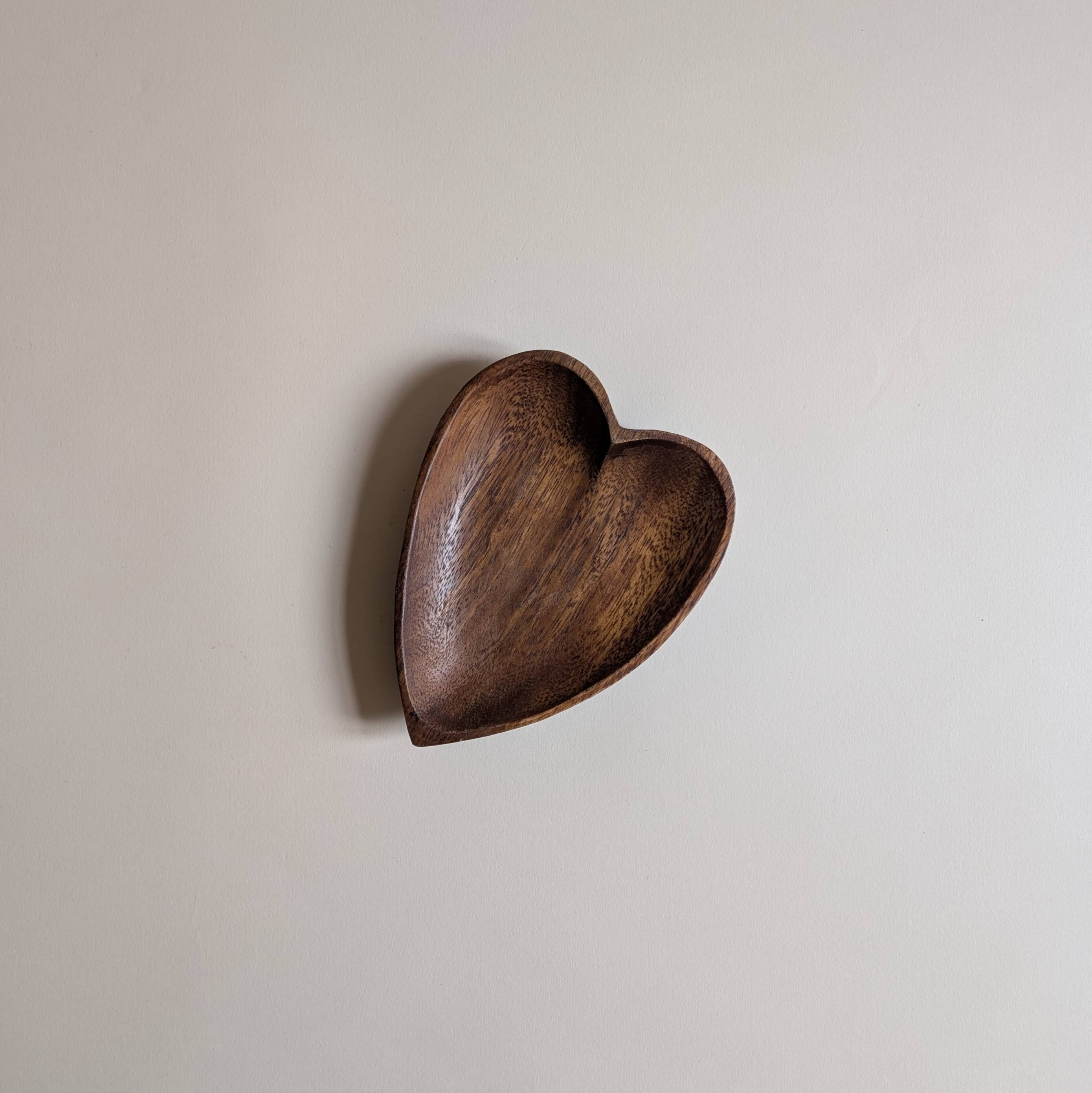 Heart-shaped pocket emptier