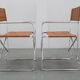 1970s pair of Italian folding chairs with leatherette upholstery