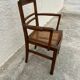 Cane armchair with armrests