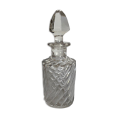 Transparent chiseled glass bottle