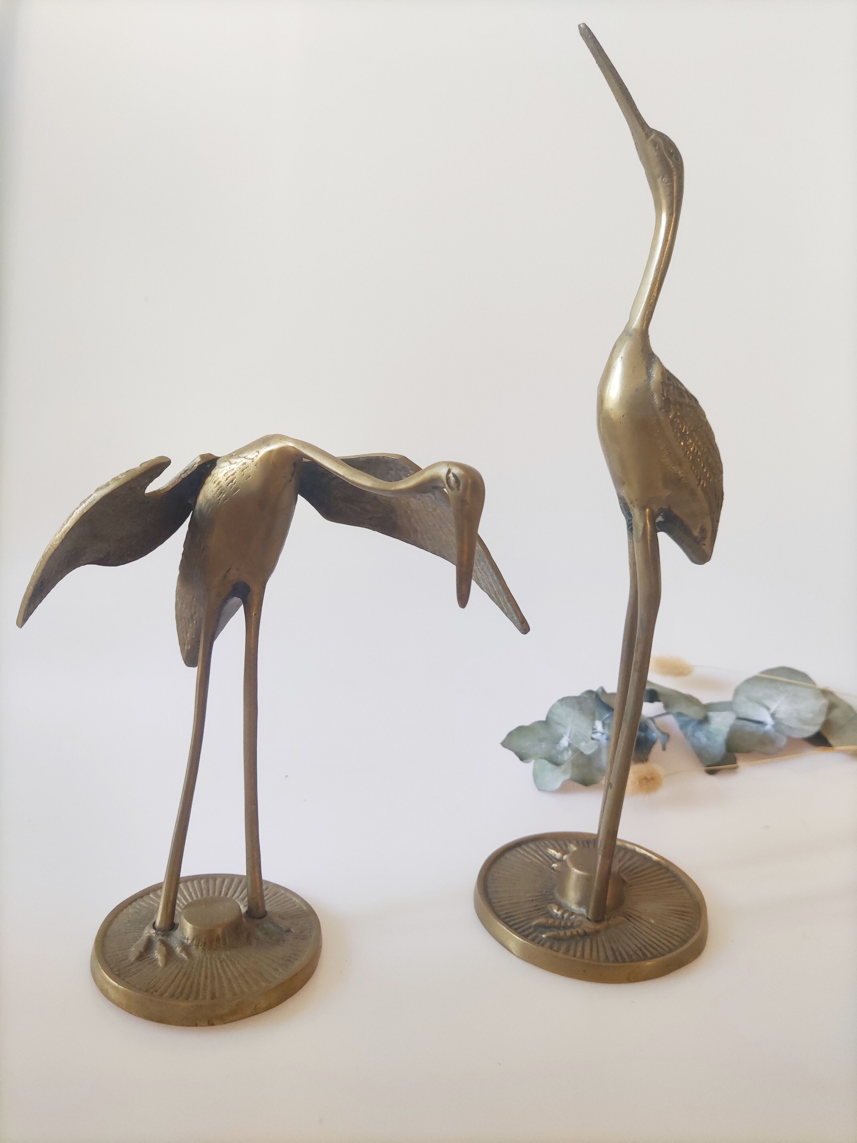 Brass heron duo
