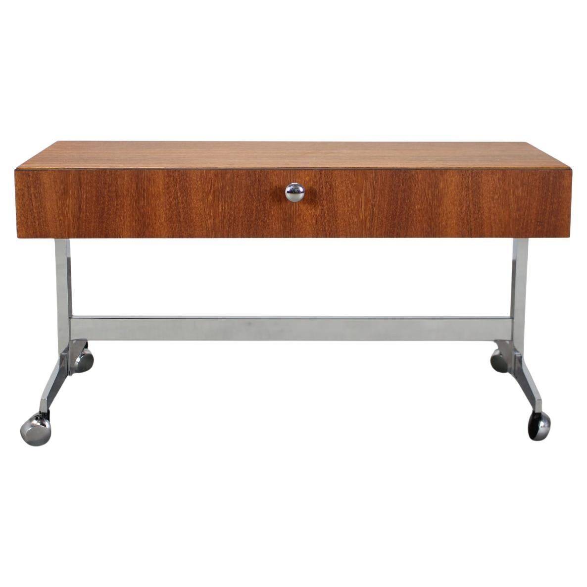 Restored Danish teak rolling media console, 1970s.