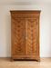 Armoire ancienne en noyer et placage papillon Ancien Bois