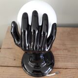 Hand and opaline globe wall light