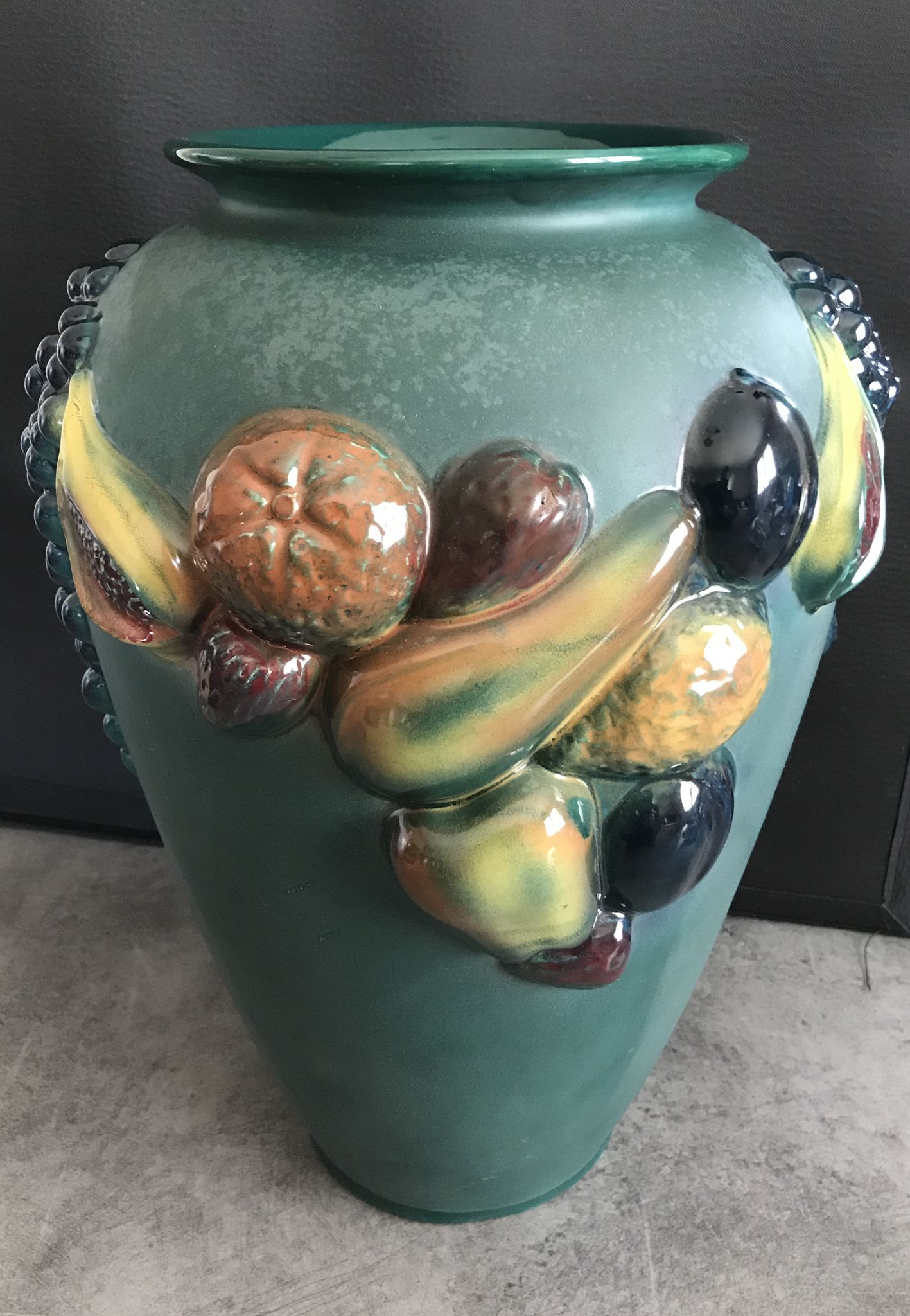 Green ceramic vase with polychrome decoration of fruits and vegetables in relief 33.5 cm