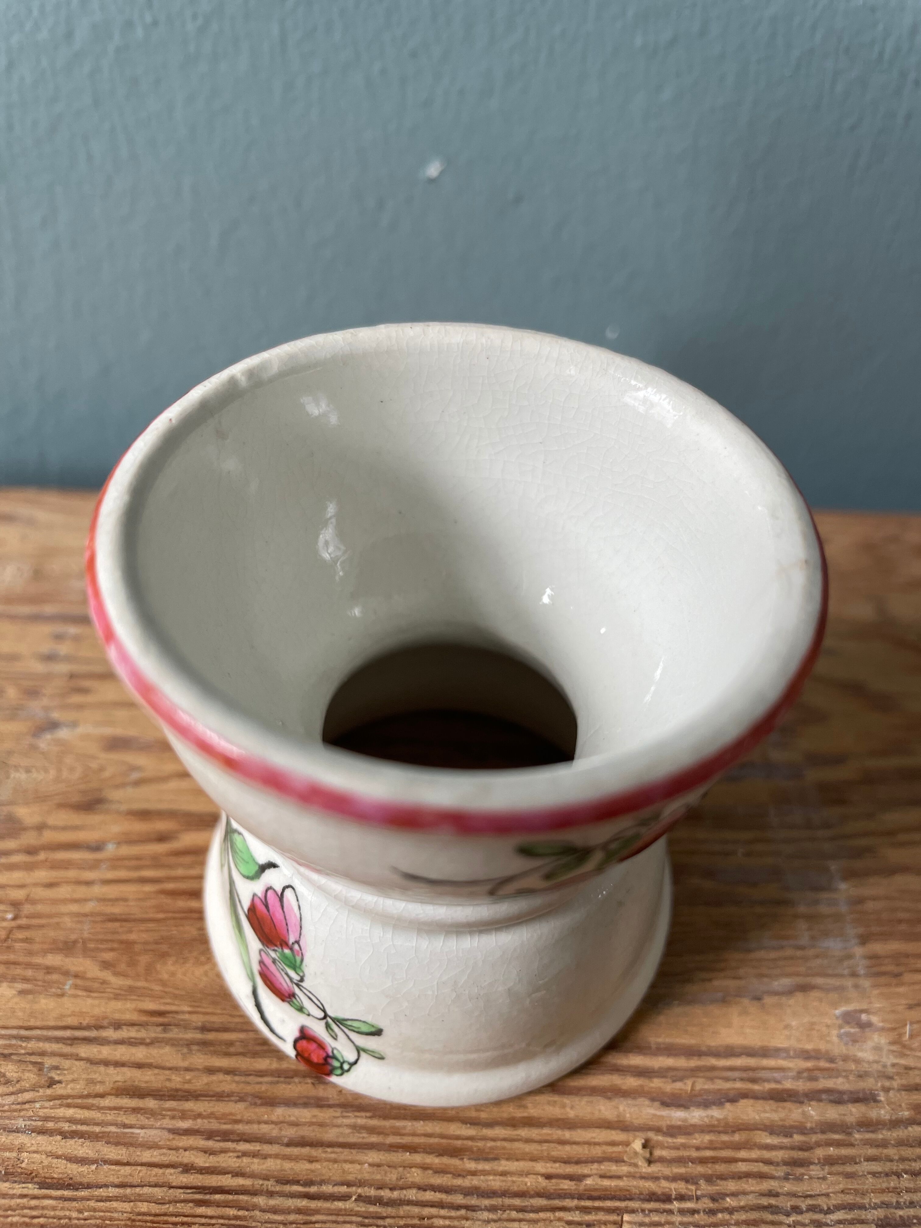 Pair of diabolo eggcups in ancient earthenware