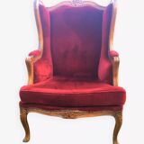 Louis XV style carved wooden winged bergère
