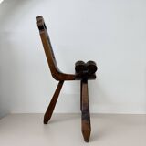 Brutalist hand carved oak Spanish tripod chair , 1970s