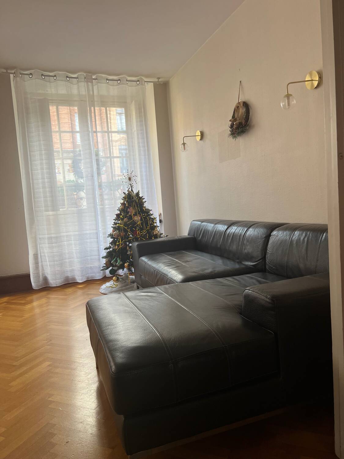 Black leather corner sofa – IKEA KRAMFORS – timeless design