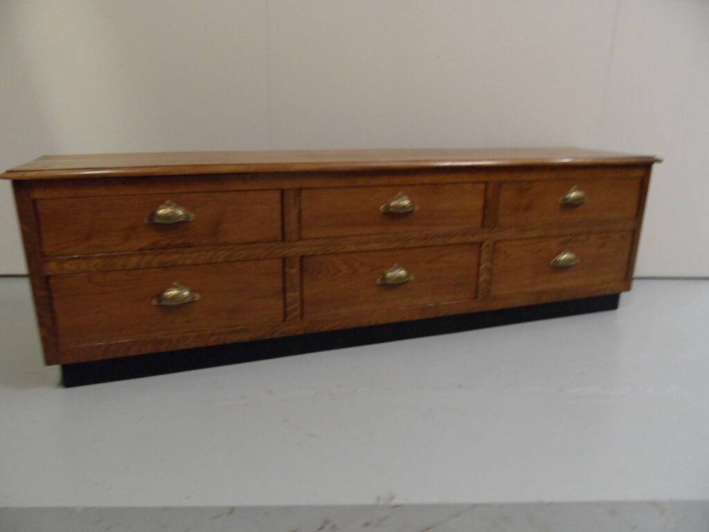 Vintage low TV cabinet from the 1950s with drawers.