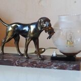 French Art Deco hunting dog on a marble base with a switched lamp.
