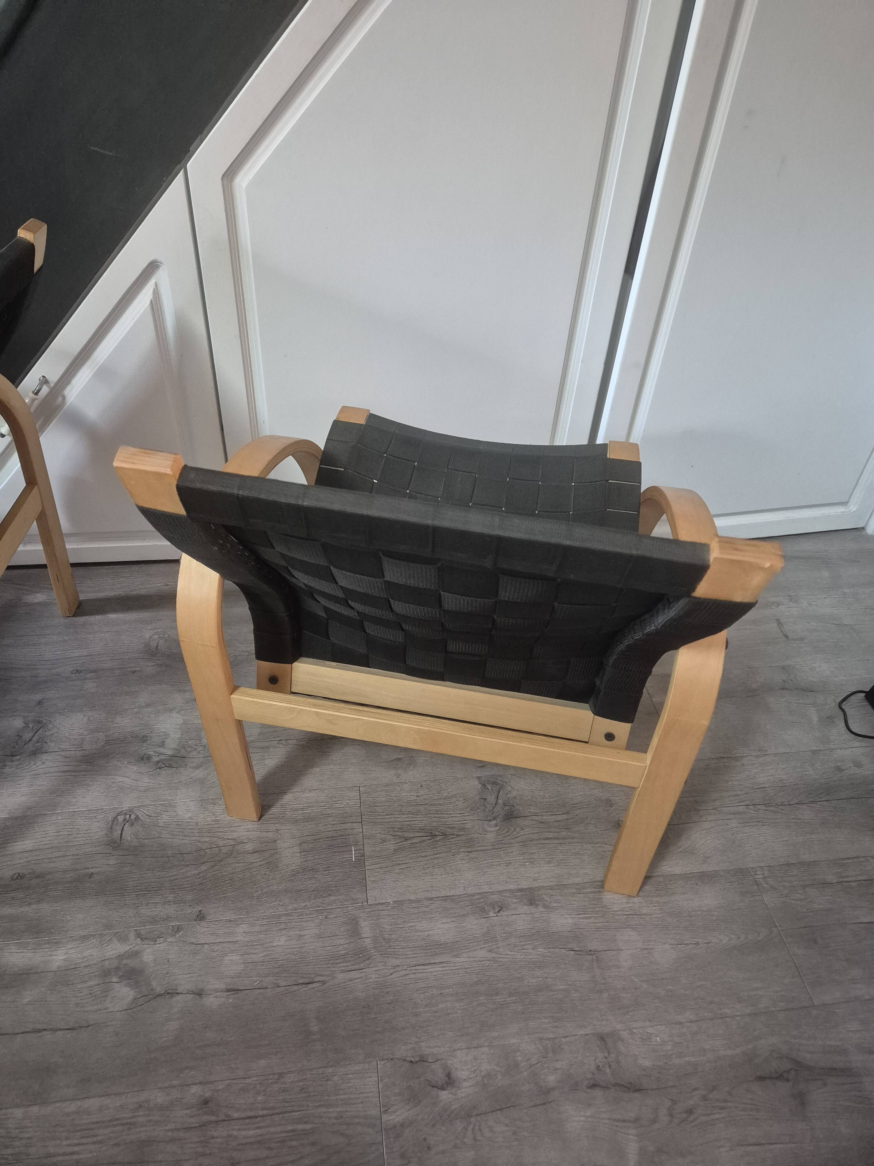 pair set of 2 armchairs with a wooden frame and black fabric weaving