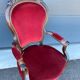 Fauteuil voltaire en velours rouge