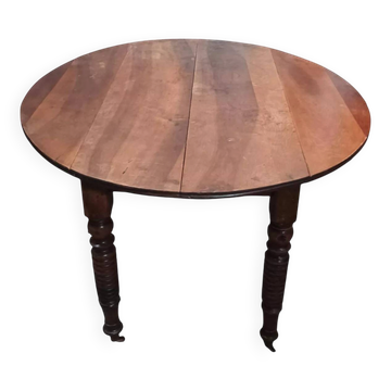 19th-century Louis Philippe walnut drop-leaf table.