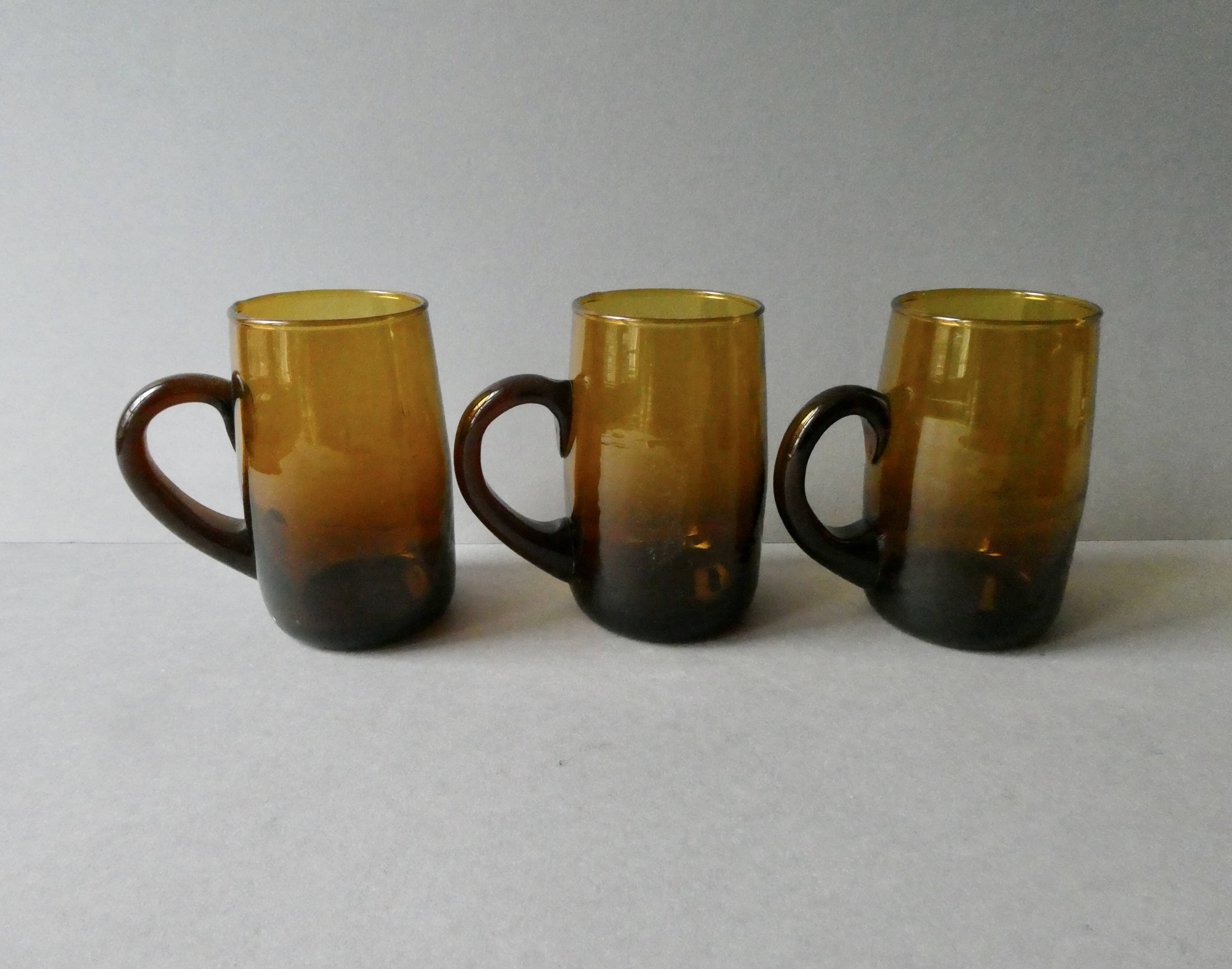 1 blown glass pitcher and its cups, 60s-70s