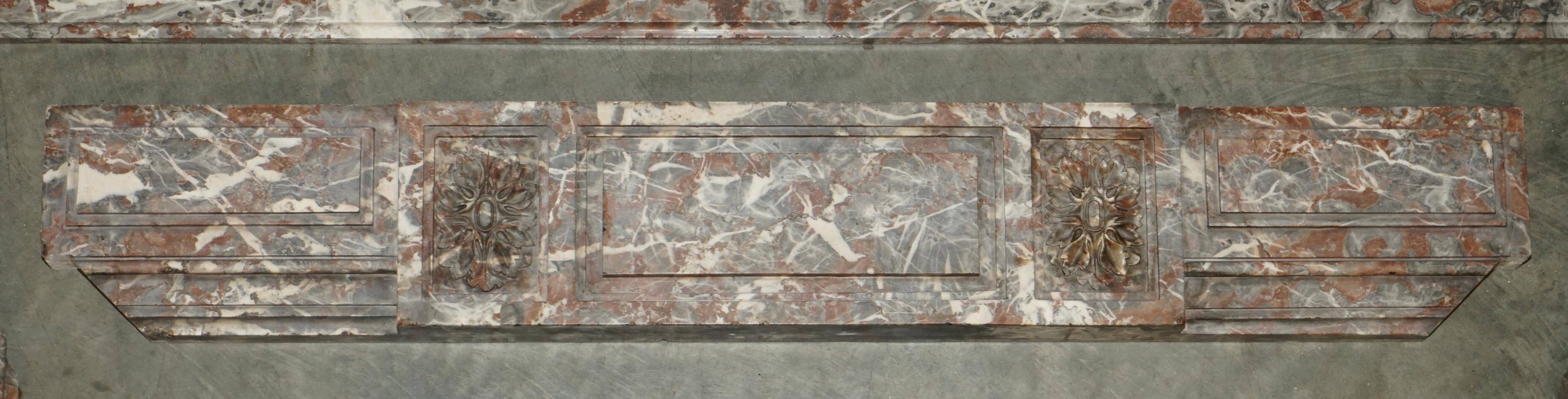 Antique marble fireplace in Saint Remy, Louis XVI style.